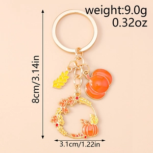 Detailed size and weight view of autumn pumpkin and maple leaf wreath keychain charm