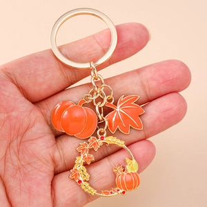 Autumn wreath pumpkin and maple leaf keychain pendant with vibrant enamel colors