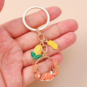 Golden Thanksgiving keychain with corn, wheat stalk and turkey charms for autumn harvest