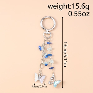 Dettaglio portachiavi a farfalla turchese con misure, lunghezza 13cm e peso di 15,6g