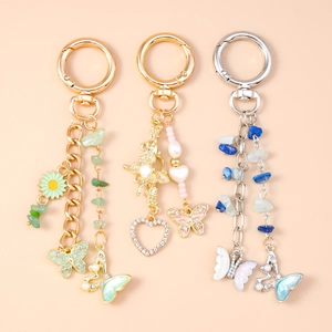 Portachiavi alla moda con farfalle e fiori placcati in oro e argento per borse