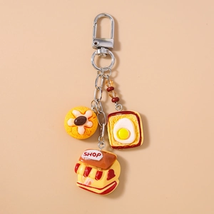 Cute food-themed keychain with donut, toast, and mini shop charms on golden alloy ring