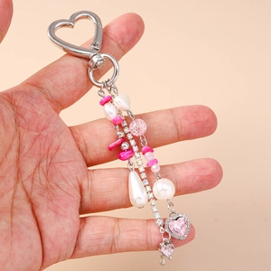 Pink heart keychain with teardrop pearls, rhinestones, and beads on metal lobster clasp