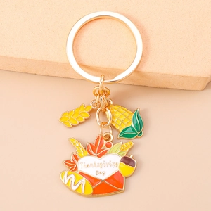 Detail of Thanksgiving keychain with gold-plated corn, wheat and heart envelope charm