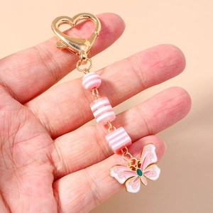 Porte-clés papillon et cœur tendance avec perles arc-en-ciel et fermoir doré