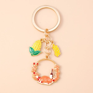 Detail of Thanksgiving keychain with colorful enamel corn, wheat and turkey charms