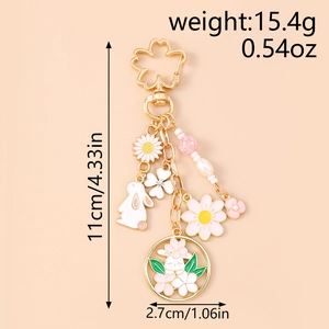 Detail view of floral rabbit keychain with dimensions 11cm and weight 15.4g