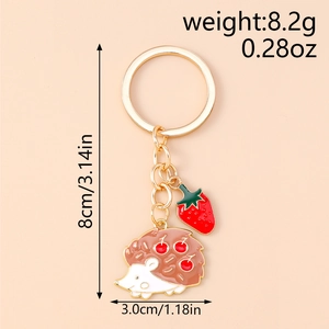 Detail of hedgehog and strawberry keychain with 8.2g weight and 8cm size dimensions