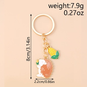 Detail showing dimensions and weight of enamel hedgehog and corn charm keychain