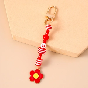 Porte-clés en perles florales avec lettre D et tulipe rouge sur crochet doré