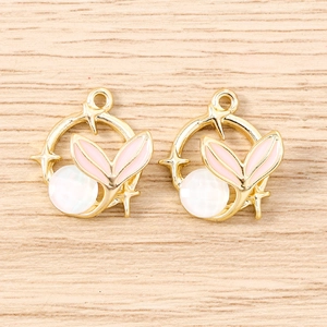 Golden ring pendant with fish tail, star, and pearl bead for jewelry making