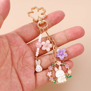 Chinese style cherry blossom rabbit keychain with gold enamel floral pendants