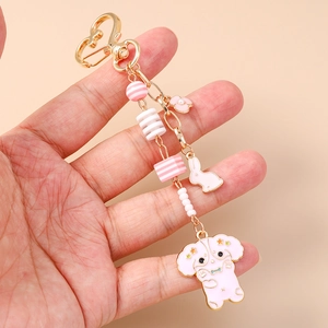 Porte-clés mignon lapin et chiot rose avec fermoir coeur doré et perles