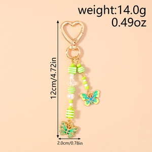 Dettaglio portachiavi a farfalla con perline con dimensioni 12cm e chiusura a cuore