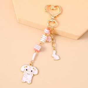 Détails de charms émaillés chiot rose et lapin blanc avec porte-clés en forme de cœur
