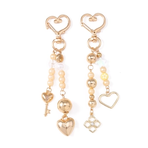 Fashionable golden beaded keychain set with 3D heart and star charms for bag decoration