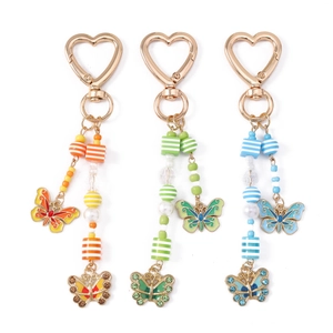 Portachiavi chic con perline a farfalla, chiusure a cuore e strass scintillanti