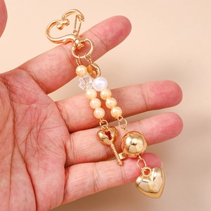 Fashionable beaded heart keychain with golden key and 3D star charms for bag accessory