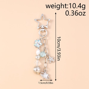 Dimensioni del portachiavi con stella e perla: 10cm di altezza e 1,5cm di larghezza