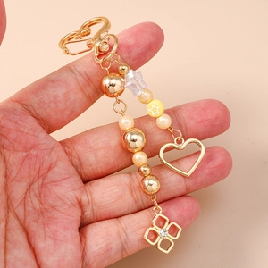 Fashionable beaded heart and star keychain with gold finish for bags and accessories