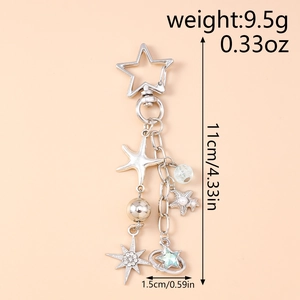 Dettaglio del portachiavi a stella argento con misure 11cm e peso 9,5g mostrati