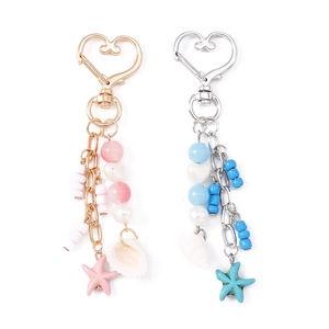 Marine theme keychain with beaded starfish and seashell charms on heart buckle