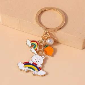 Cute rainbow bear keychain with golden ring, carrot charm and white pearl pendant