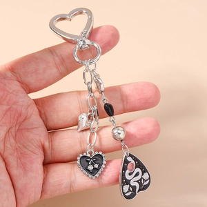 Sparkling heart keychain with rhinestones and cherry pendant on a heart-shaped silver hook