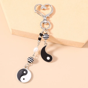 Tai Chi Yin Yang keychain with silver heart clasp and black white beads for bags