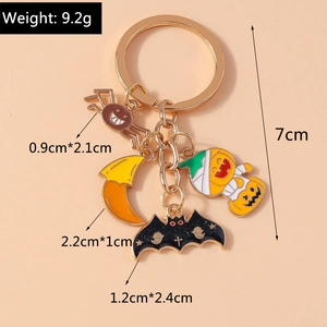 Detailed Halloween keychain showing spider, bat, and pumpkin charms with size measurements