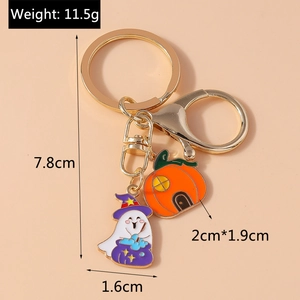 Detail of Halloween ghost and pumpkin charms with dimensions and 11.5g weight info