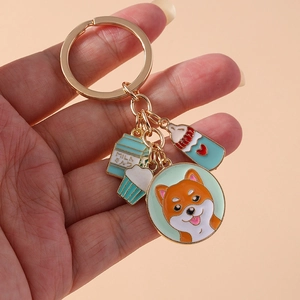 Porte-clés en métal doré avec breloques émaillées Shiba Inu, brique de lait et cupcake