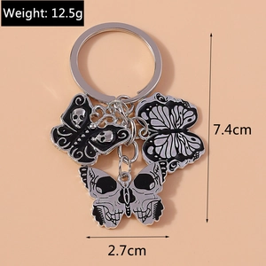 Gothic butterfly keychain dimensions showing 7.4cm height and 12.5g weight detail