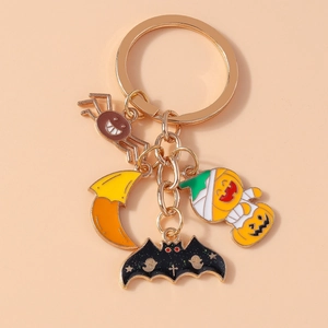 Detail of Halloween keychain with spider, moon, black bat, and pumpkin pendants