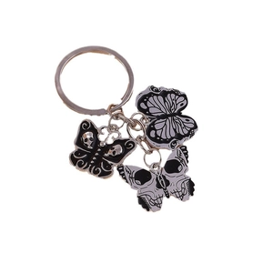 Gothic skull butterfly keychain in black and white enamel with durable alloy metal rings