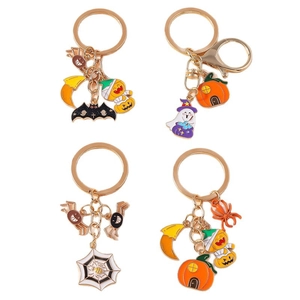 Halloween keychain set with ghost, pumpkin, spider, and bat charms in gold finish