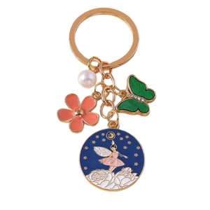 Porte-clés fée et fleur doré avec pendentif en émail, papillon vert et breloque perle
