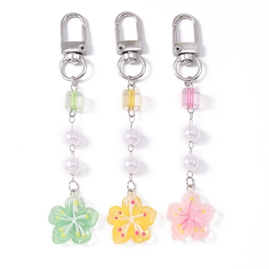 Three colorful resin flower keychains with white pearls and silver lobster clasps