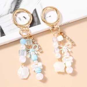Porte-clés Perles en Résine à la Mode Avec Pendentif Nœud Coquillage Chaîne en Alliage Strass Ornement Sac Femmes Filles