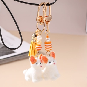 Porte-clés chien Corgi en peluche mignons avec gland jaune et fermoir en métal doré