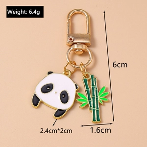 Détails du porte-clés panda et bambou avec dimensions précises et poids en grammes