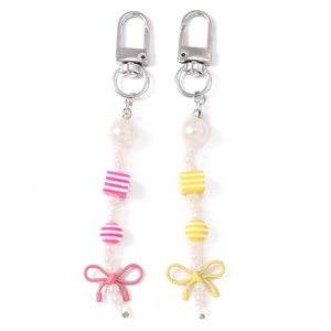 Sweet pearl beaded keychain with ribbon bow pendant in pink and yellow colors