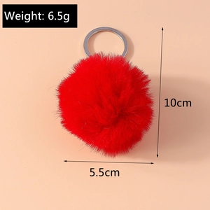 Detail showing red faux fur keychain with silver ring measuring 10cm total height