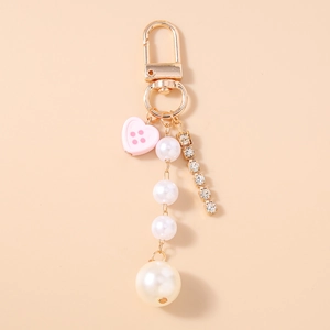 Portachiavi alla moda con perle, bottone a cuore rosa e catena di cristalli su metallo oro