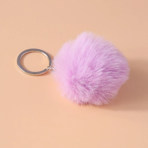Detail of 8cm light purple fluffy faux fur pompom keychain with silver metal ring