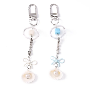 Porte-clés tendance avec chaîne en strass, nœud et pendentif perle en bleu et crème