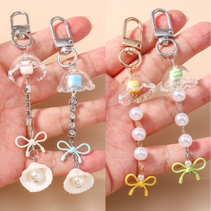 Porte-clés Nœud avec Chaîne en Strass à la Mode Pendentif Coquillage Fleur Künstliche Perle d'Imitation Bijoux de Sac pour Femme Accessoires