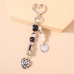 Détails du porte-clés perlé avec breloque LOVE YOU en argent et boule d'étoile en métal