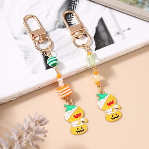 Halloween pumpkin and mummy keychain set with colorful beads and golden lobster clasp
