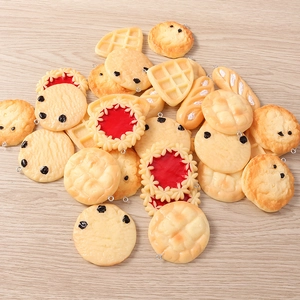 Detail of assorted resin food charms including waffles and donuts for DIY jewelry making